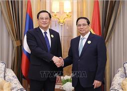 Thủ tướng Chính phủ Phạm Minh Chính gặp Thủ tướng Lào Sonexay Siphandone